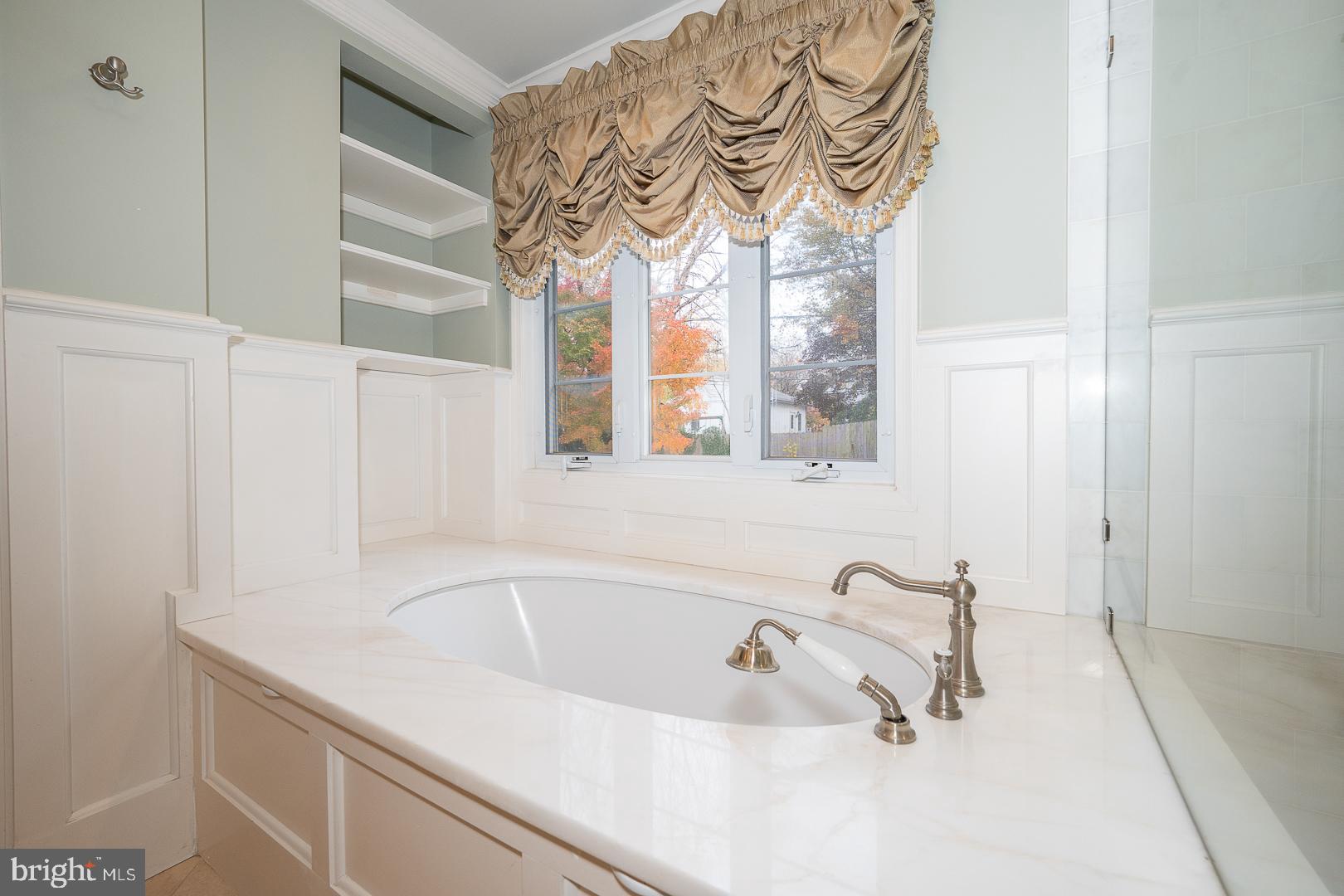 346 Winding Way Merion Station, PA 19066 - Photo 32 of 51 a bathroom with a bathtub and a sink
