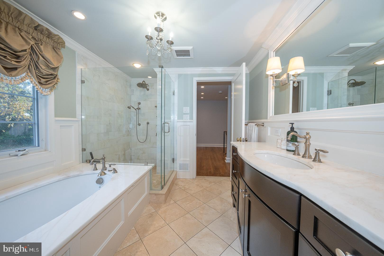 346 Winding Way Merion Station, PA 19066 - Photo 33 of 51 a spacious bathroom with a bathtub shower sink double and mirror