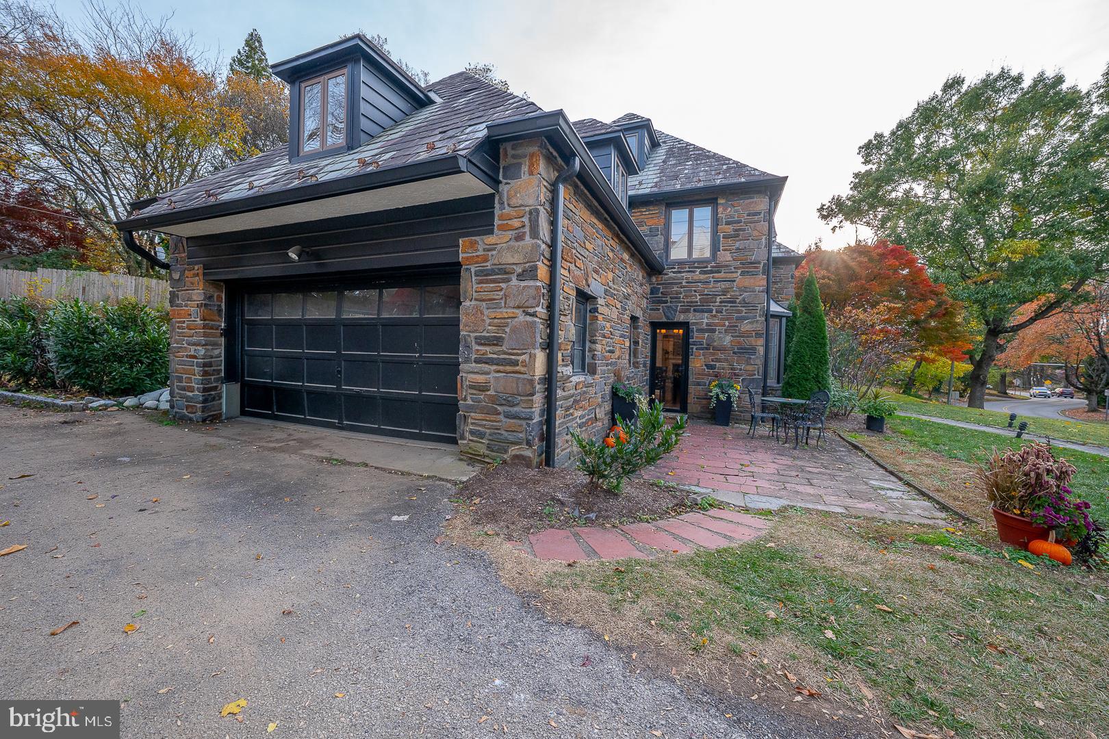 346 Winding Way Merion Station, PA 19066 - Photo 47 of 51 a front view of a house with a yard