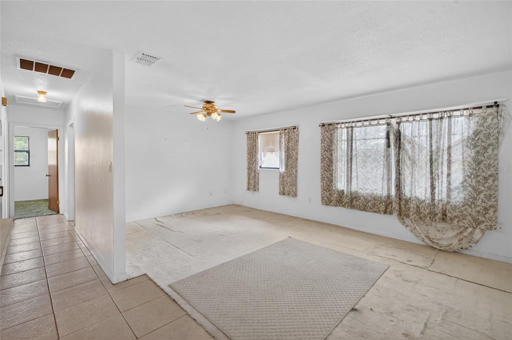 34618 South Haines Creek Road Leesburg, FL 34788 - Photo 24 of 41 a view of an empty room with a window