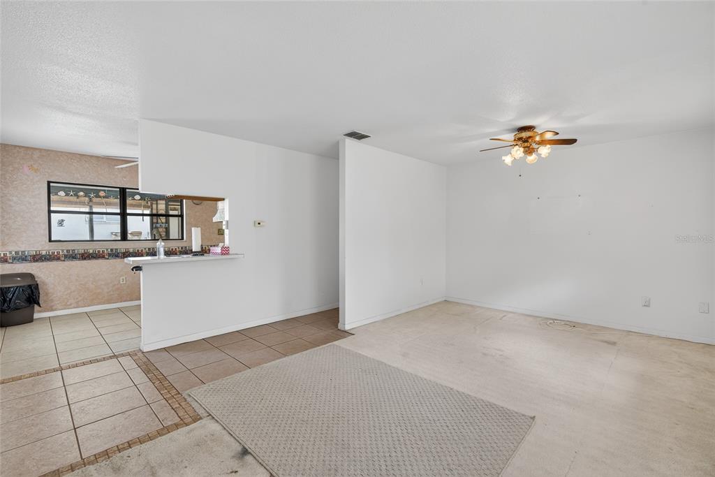 34618 South Haines Creek Road Leesburg, FL 34788 - Photo 25 of 41 a view of a room with a large window