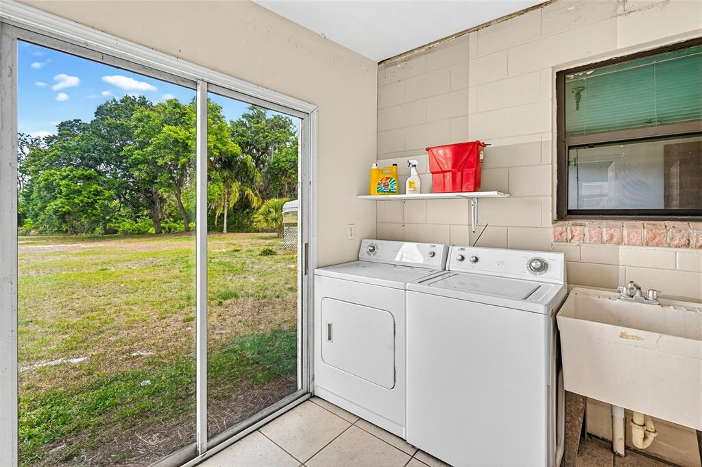 34618 South Haines Creek Road Leesburg, FL 34788 - Photo 41 of 41 a utility room with washer and dryer