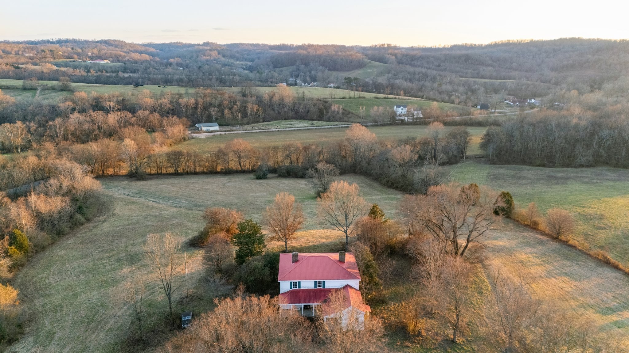 3213 Craig Bridge Road Williamsport, TN 38487 - Photo 7 of 47 a view of a town with mountains in the background