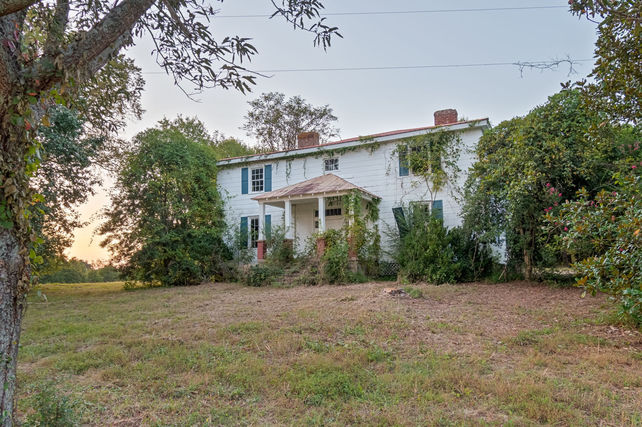 3213 Craig Bridge Road Williamsport, TN 38487 - Photo 9 of 47 a front view of a house with a yard