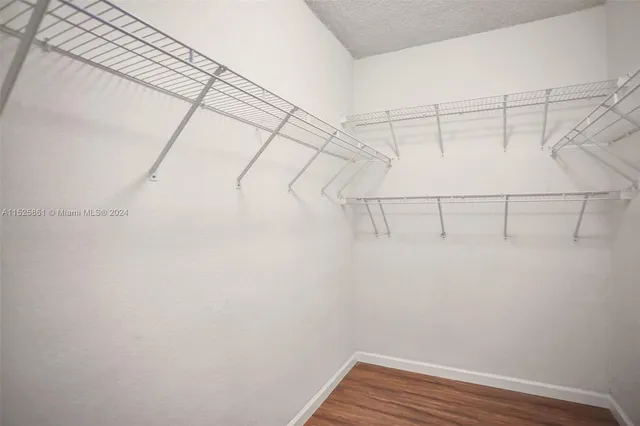 a view of a room with racks on the wall