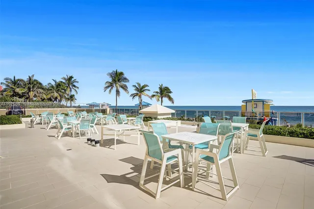 a view of a terrace with furniture and stove