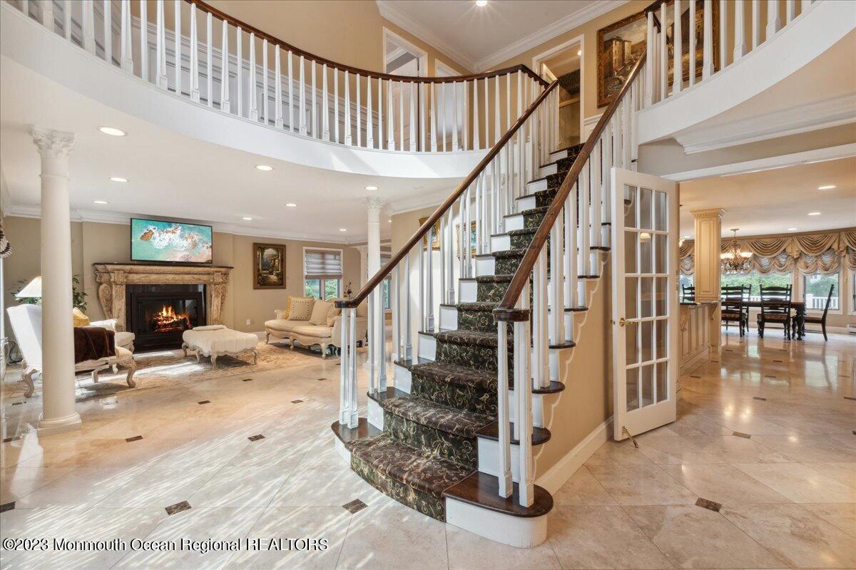4 Beaver Hill Road Morganville, NJ 07751 - Photo 5 of 71 a view of entryway livingroom and hall