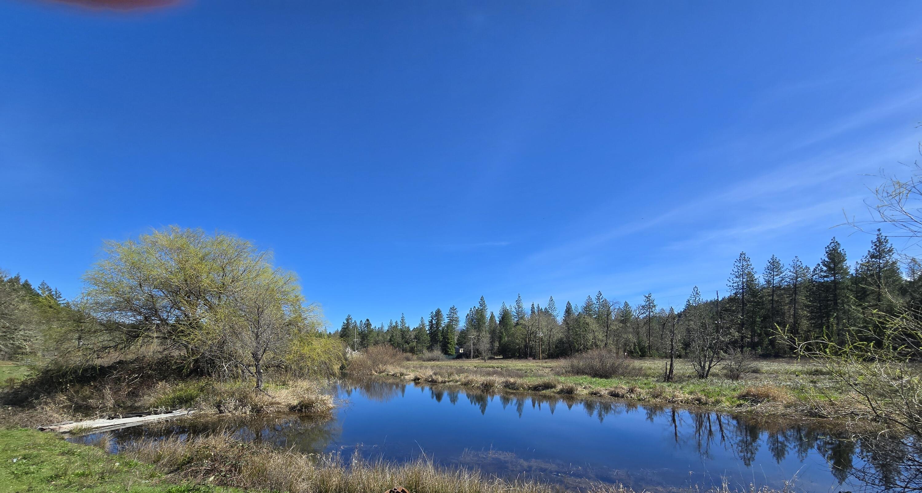 147 Warren Road Selma, OR 97538 - Photo 5 of 16 a view of mountain and a lake