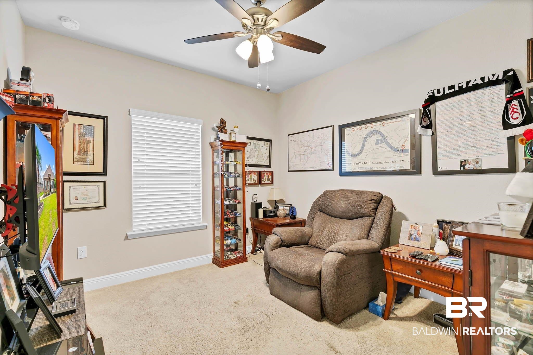 2049 Bourbon Street Foley, AL 36535 - Photo 25 of 56 Living area featuring a ceiling fan, carpet, and an office area