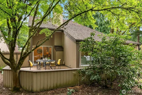a outdoor living space with furniture and garden view