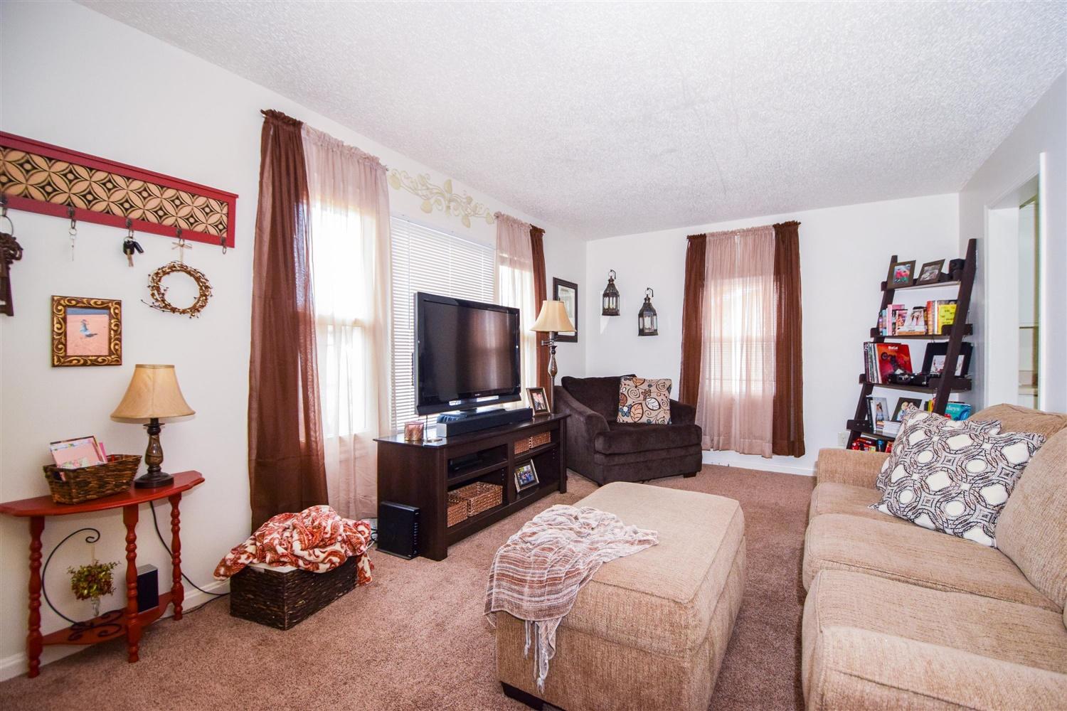 1914 Burma Road Salem, VA 24153 - Photo 4 of 20 a living room with furniture and a flat screen tv