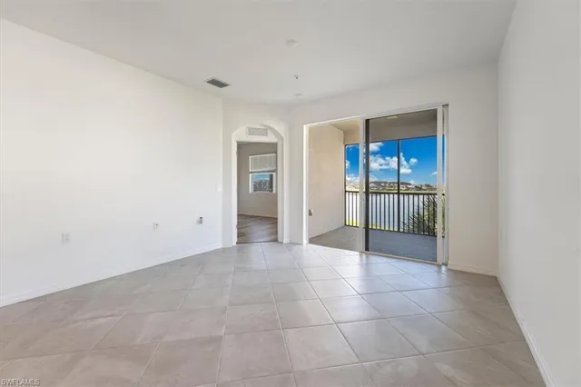 a view of a street with a yard