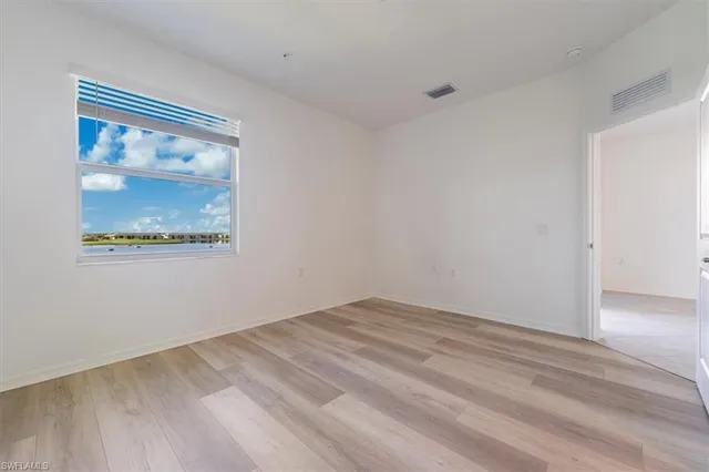 a view of an ocean and a mountain