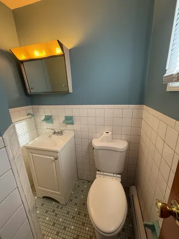 a bathroom with a sink and a toilet