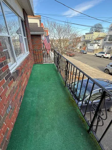 a view of a porch with a yard