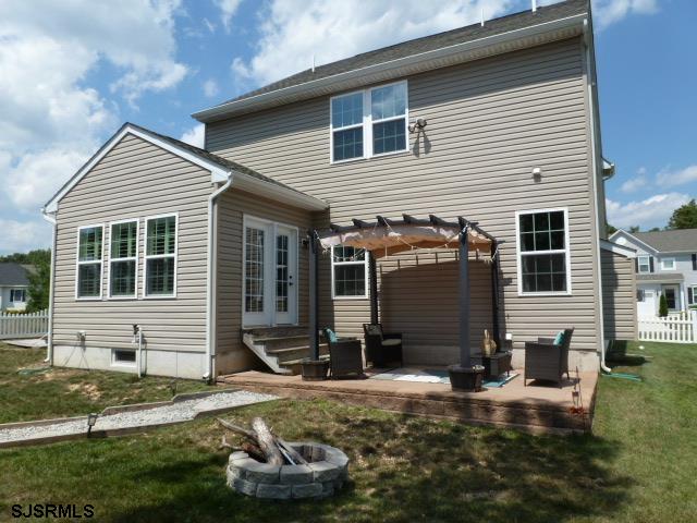 218 Surf Road Egg Harbor Township, NJ 08234 - Photo 25 of 28 a front view of a house with a yard
