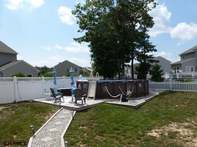 218 Surf Road Egg Harbor Township, NJ 08234 - Photo 27 of 28 a view of a swimming pool with a patio