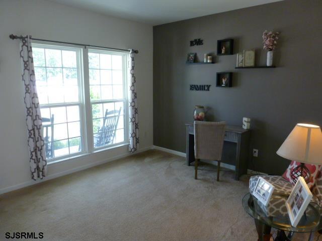 218 Surf Road Egg Harbor Township, NJ 08234 - Photo 3 of 28 a view of workspace with furniture and a window