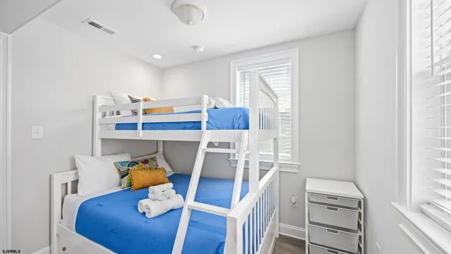 a view of kitchen with furniture and wooden floor