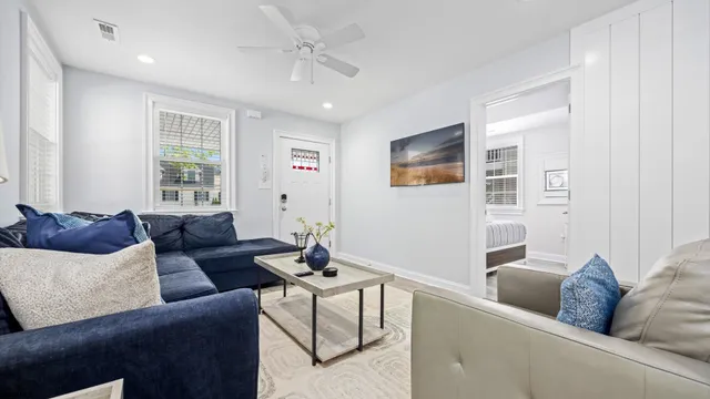 a living room with furniture and a window