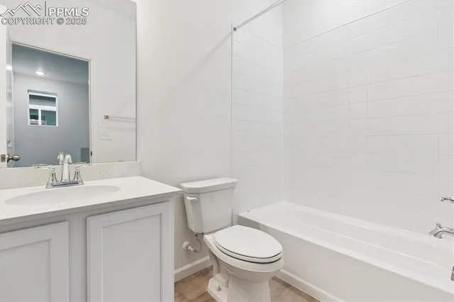 a bathroom with a sink a toilet and a bathtub