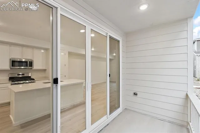 a bathroom with a shower and a sink