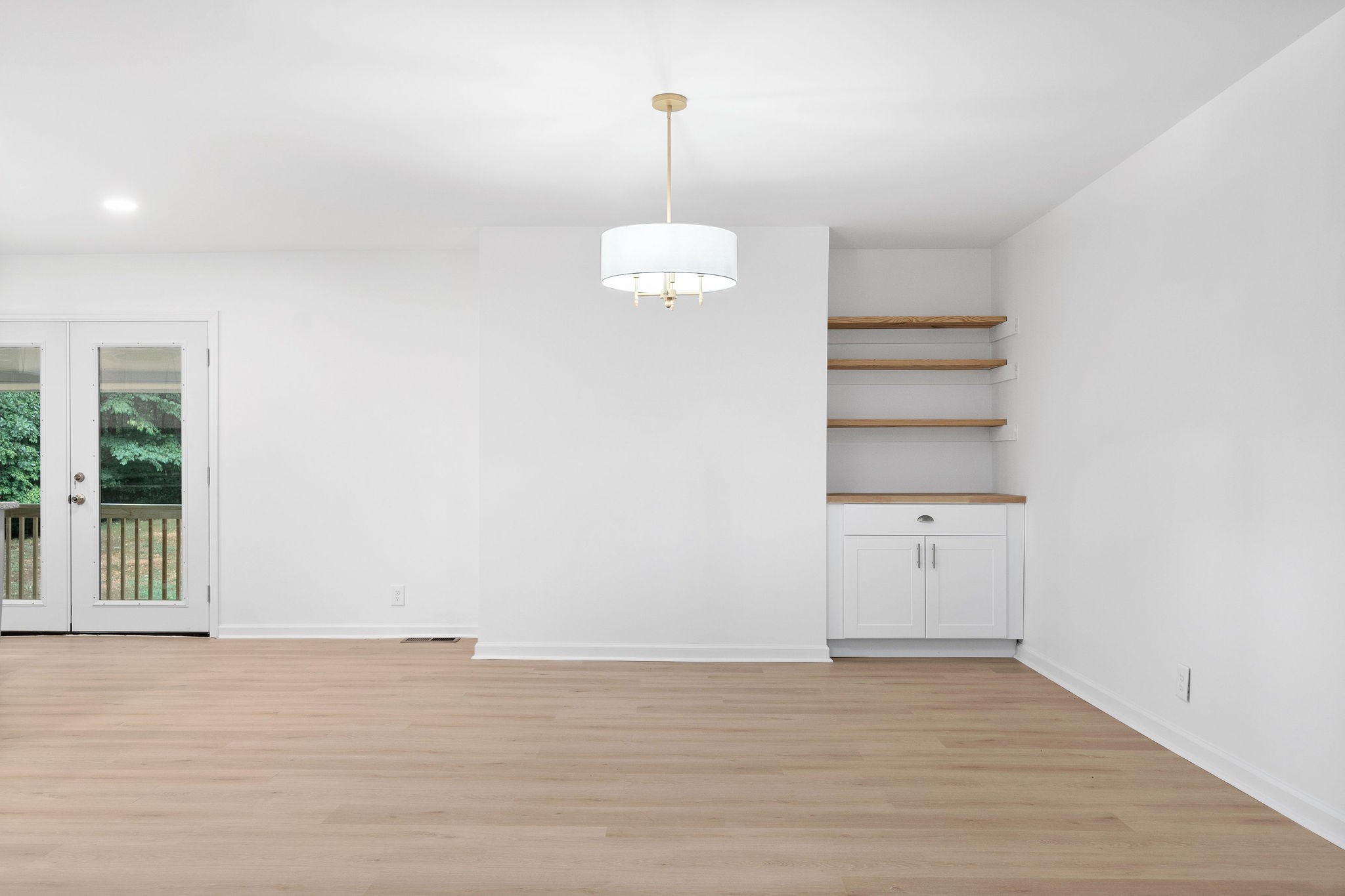 342 Highway 13 Cunningham, TN 37052 - Photo 15 of 44 a view of a room with wooden floor and window
