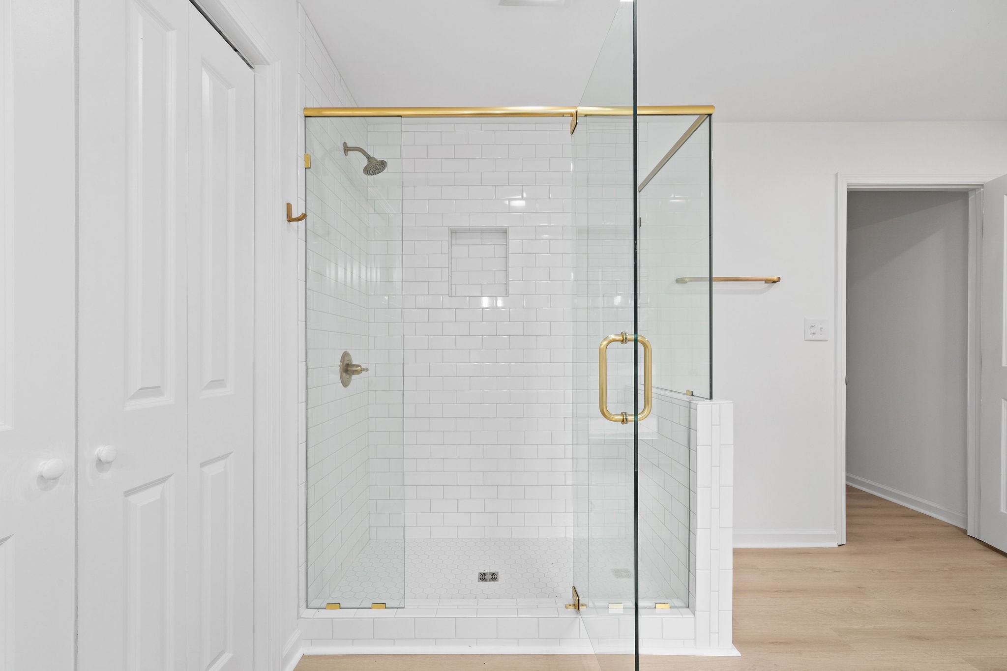 342 Highway 13 Cunningham, TN 37052 - Photo 16 of 44 a bathroom with a glass shower door