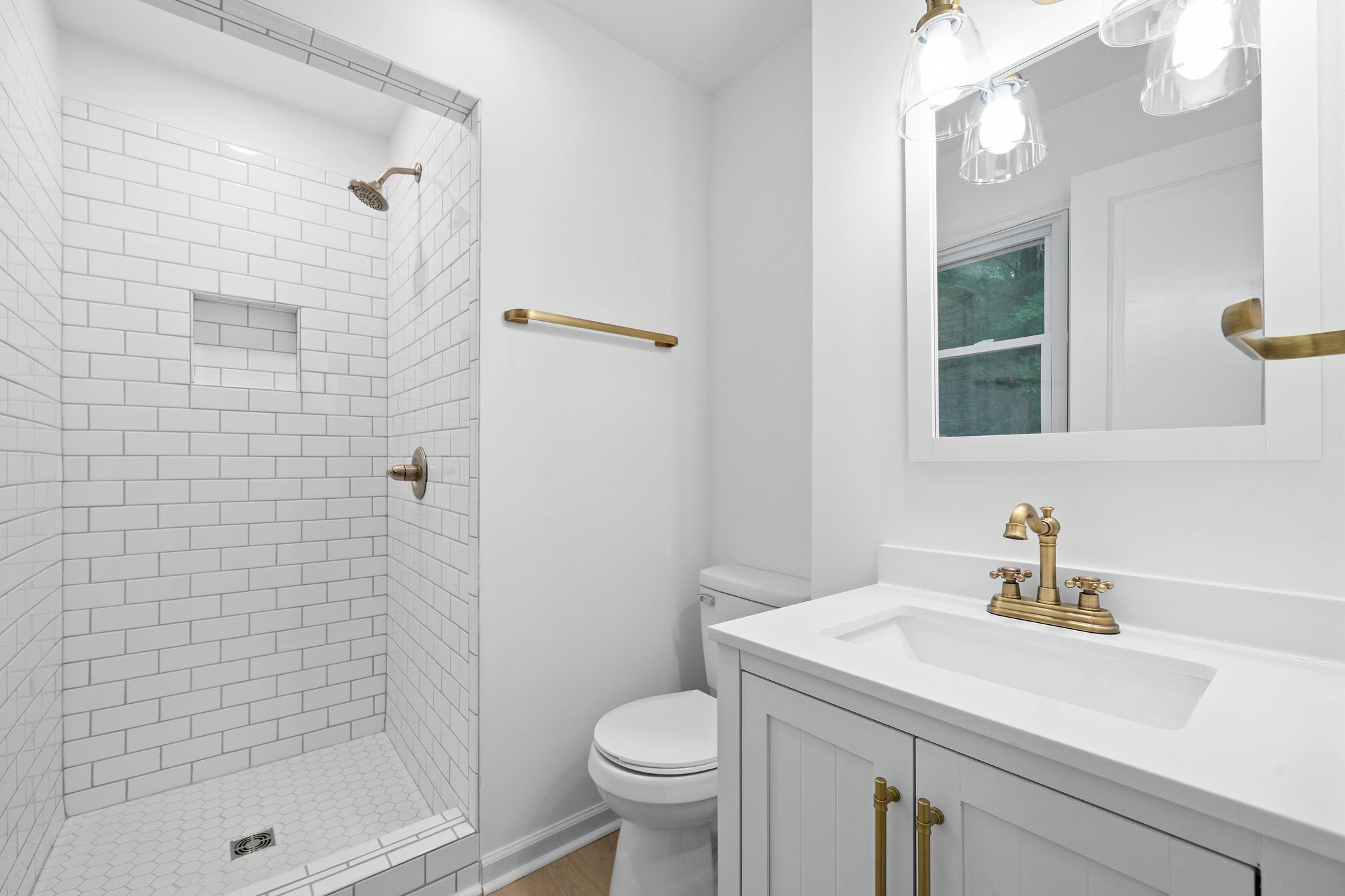 342 Highway 13 Cunningham, TN 37052 - Photo 23 of 44 a bathroom with a sink a toilet and shower