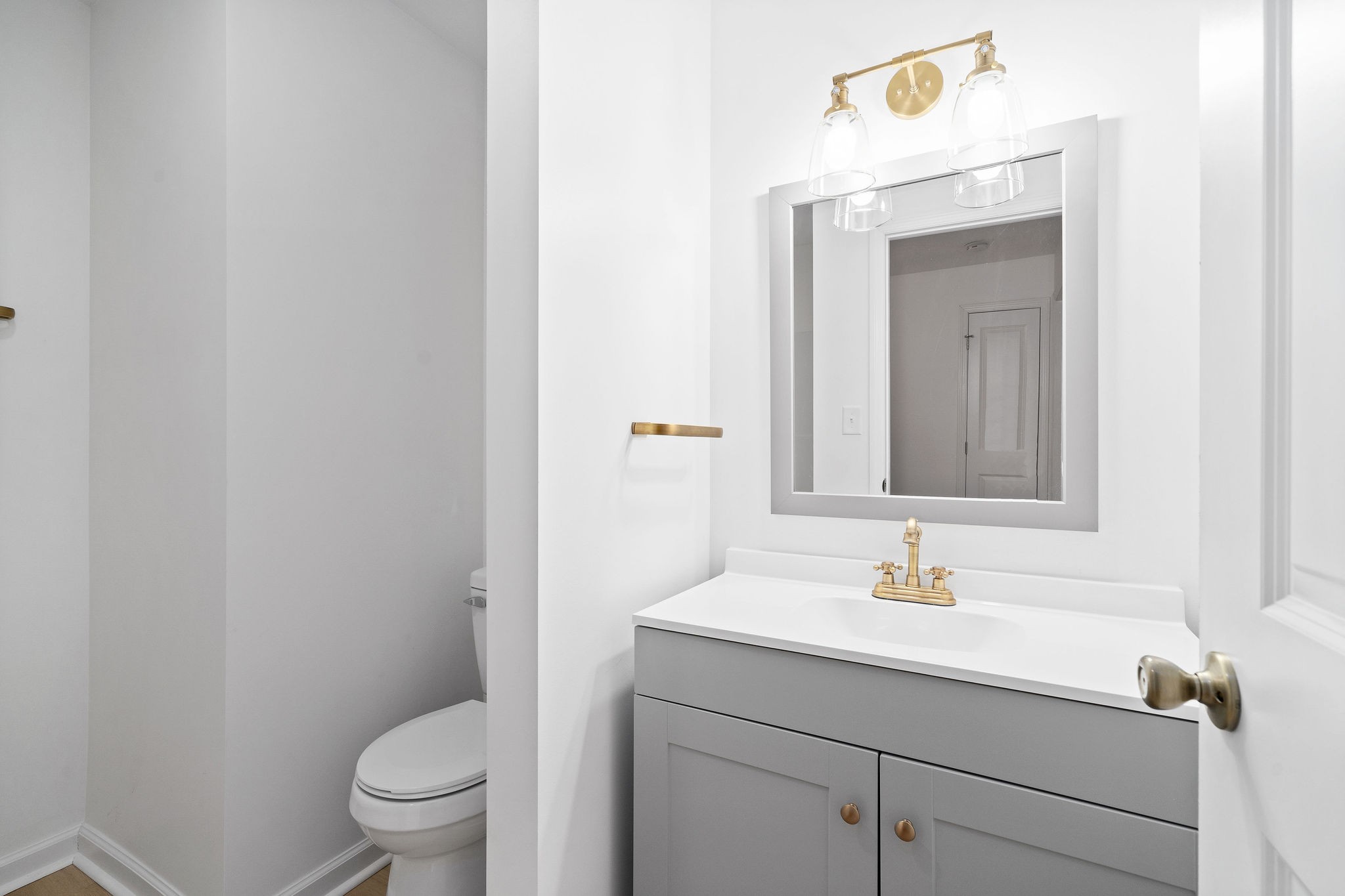 342 Highway 13 Cunningham, TN 37052 - Photo 24 of 44 a bathroom with a sink a toilet and mirror