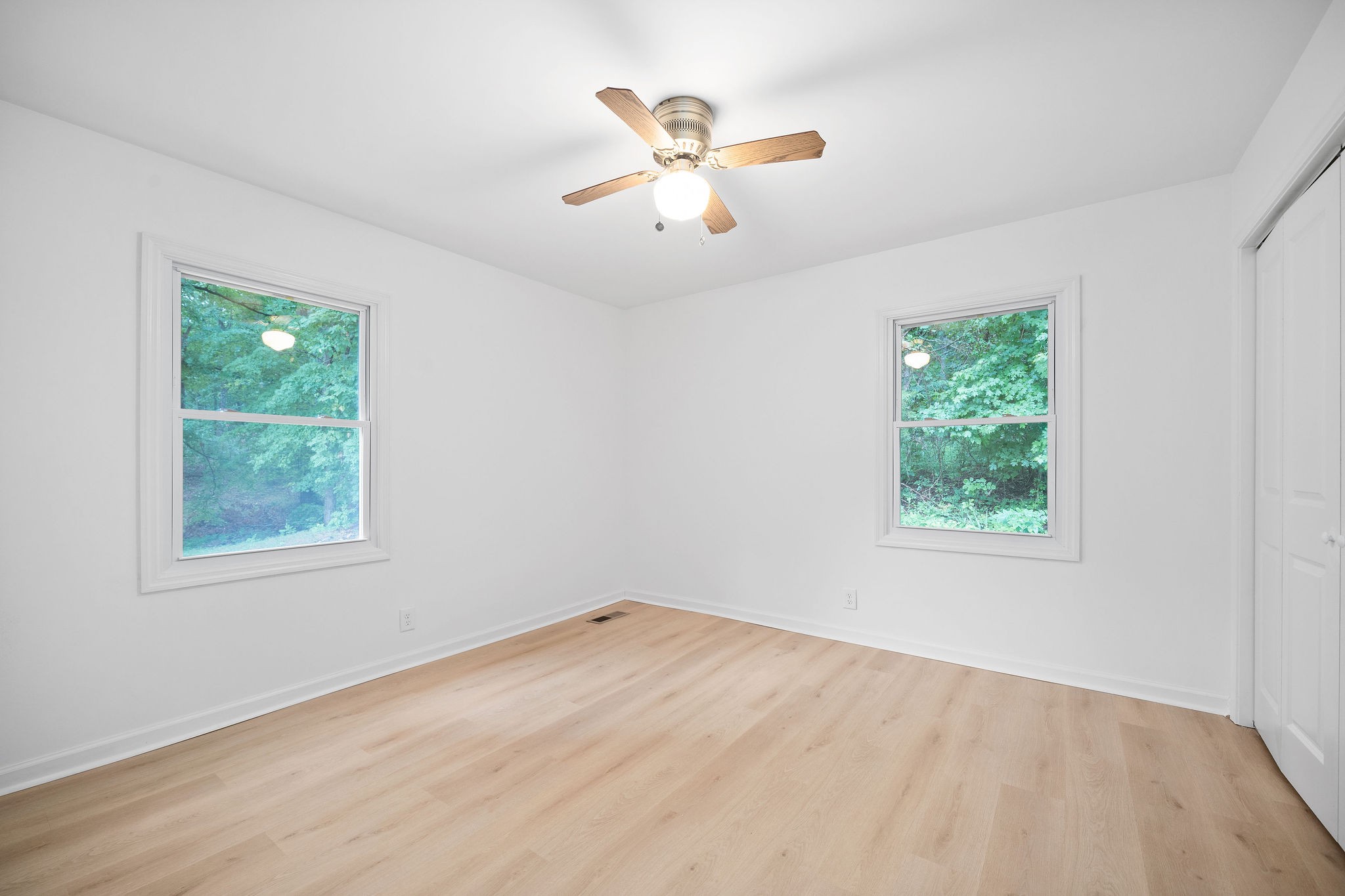 342 Highway 13 Cunningham, TN 37052 - Photo 27 of 44 an empty room with ceiling fan and window
