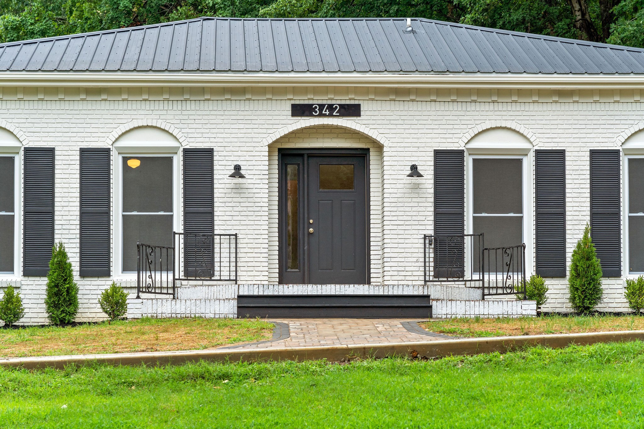 342 Highway 13 Cunningham, TN 37052 - Photo 3 of 44 a view of a house with a yard