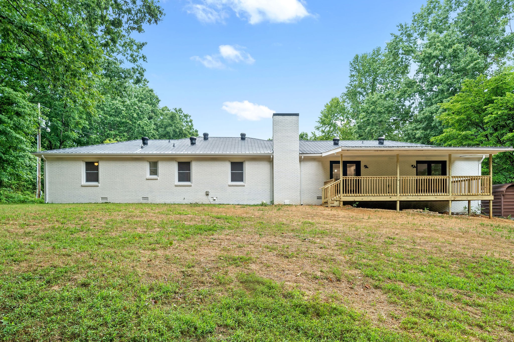 342 Highway 13 Cunningham, TN 37052 - Photo 33 of 44 a house view with a backyard space