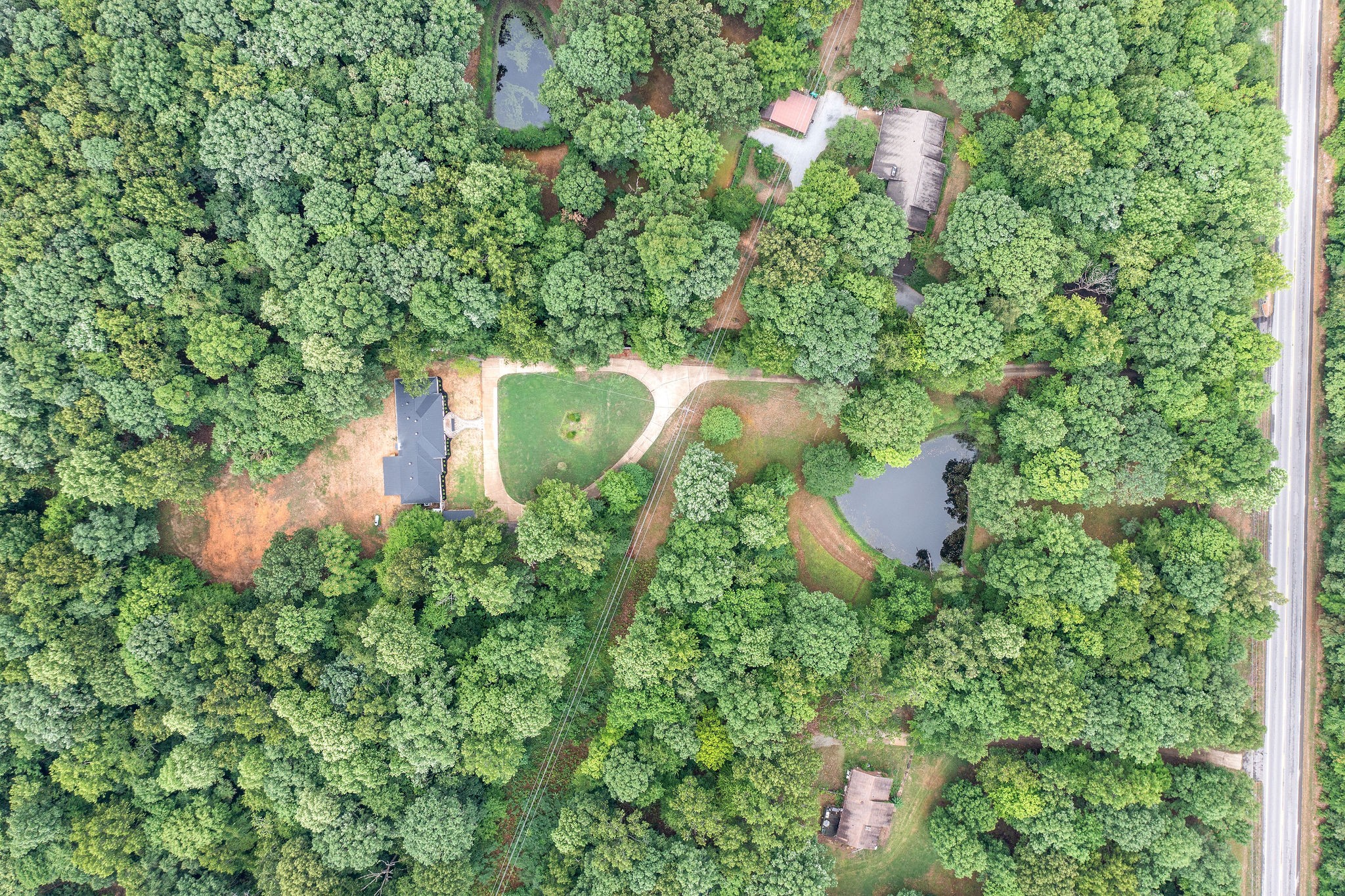 342 Highway 13 Cunningham, TN 37052 - Photo 39 of 44 a backyard of a house with outdoor seating and green space
