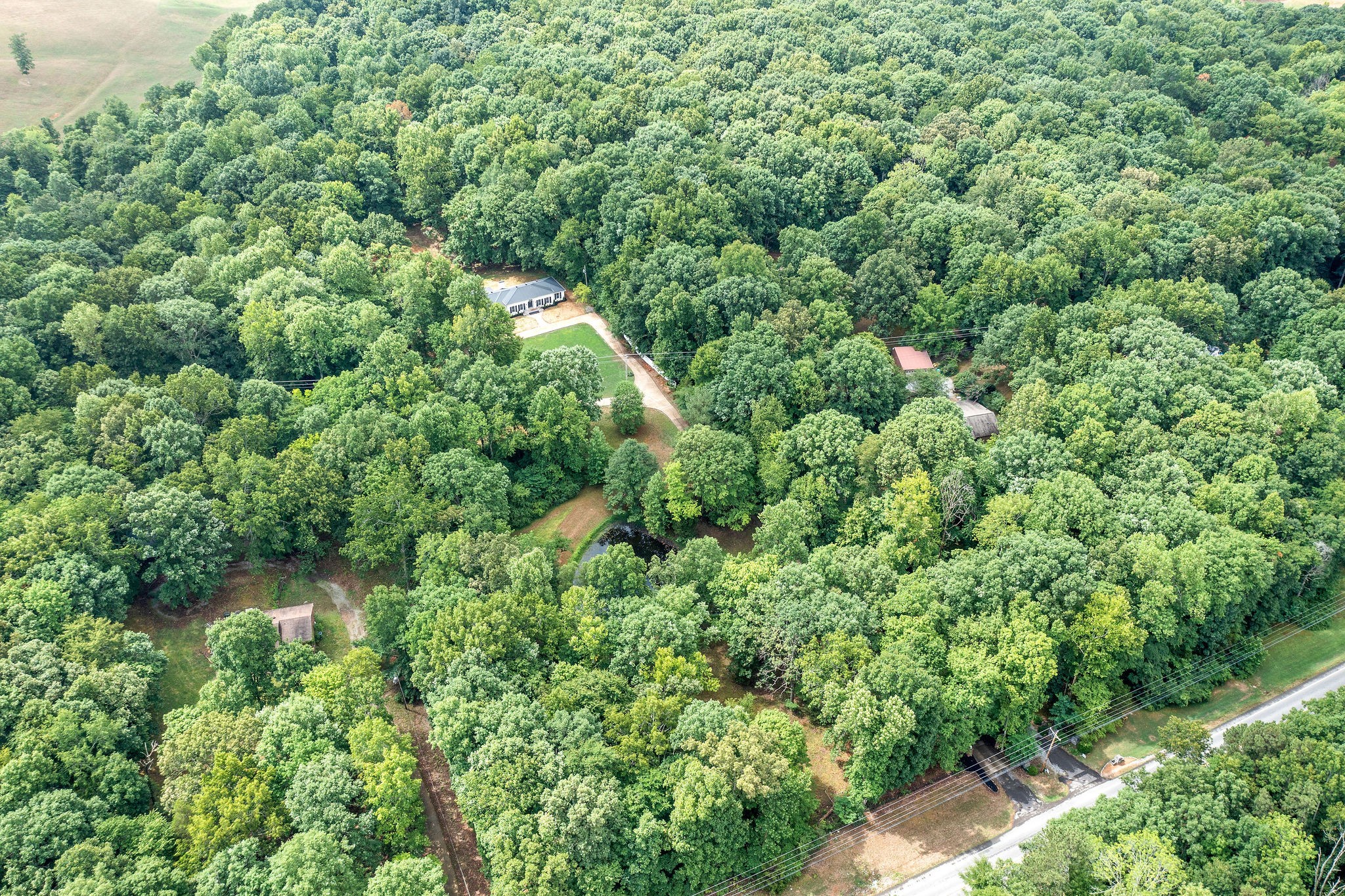 342 Highway 13 Cunningham, TN 37052 - Photo 41 of 44 an aerial view of a house with a yard