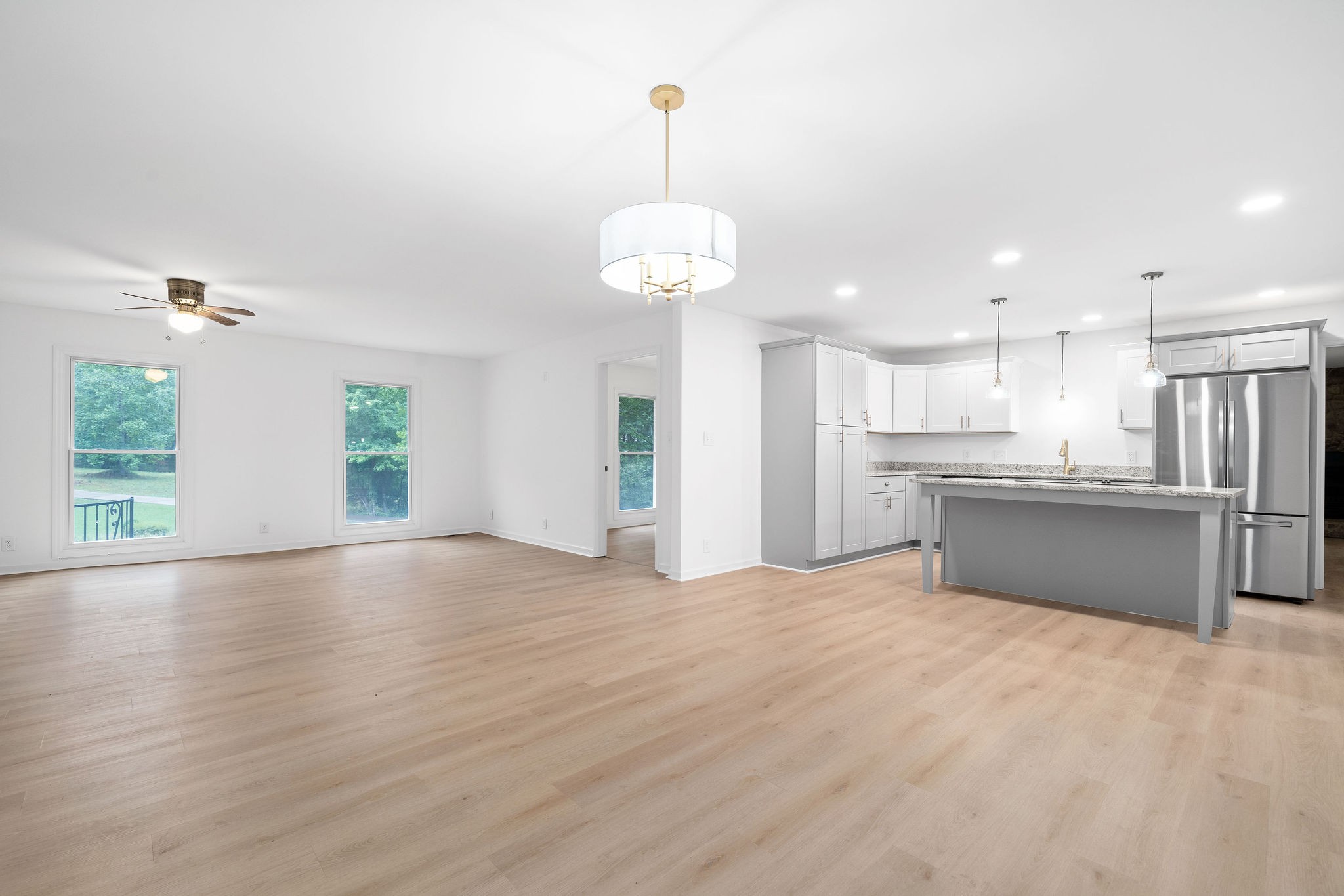 342 Highway 13 Cunningham, TN 37052 - Photo 5 of 44 a view of a kitchen with an empty space and a window