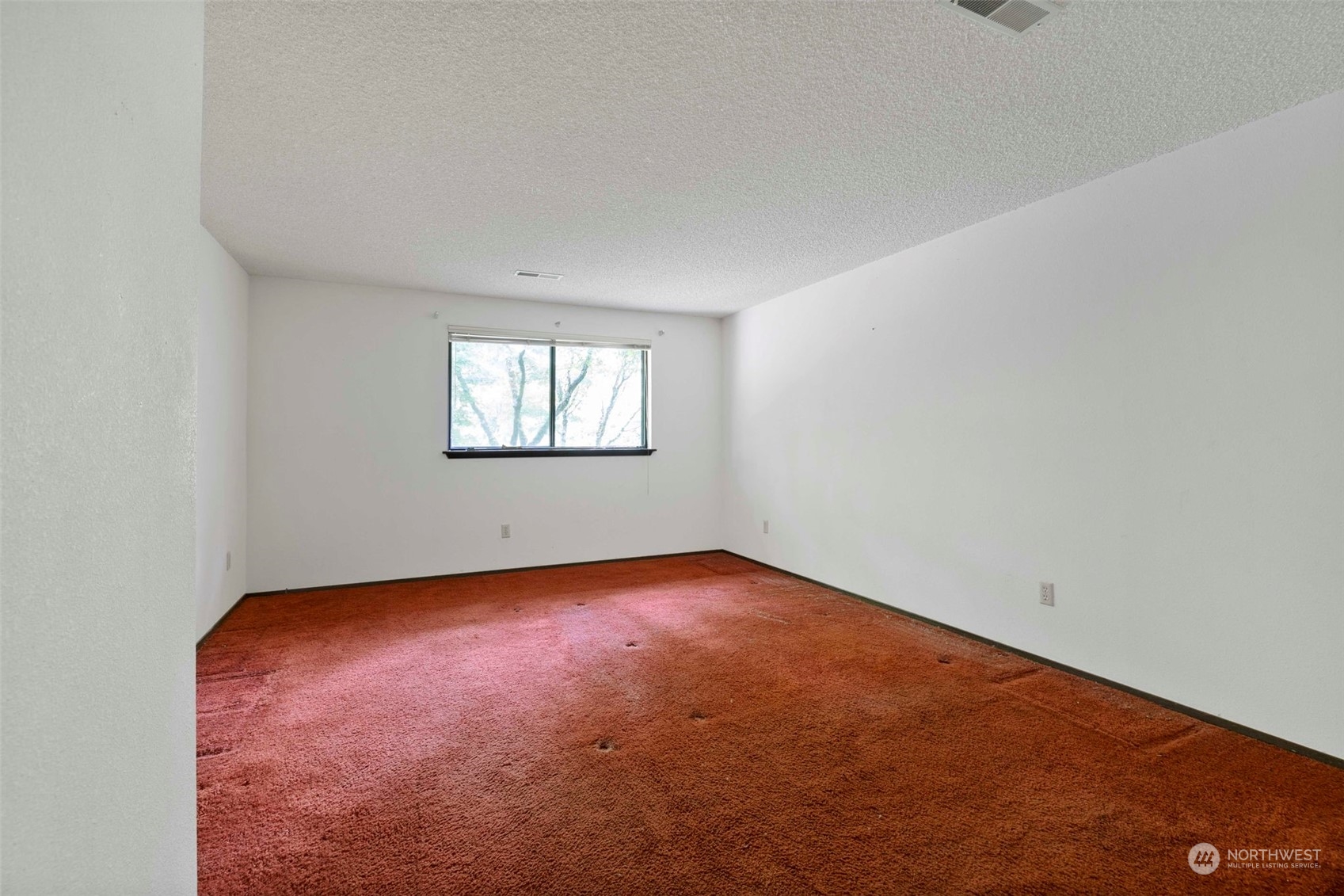 3156 Locker Road Southeast Port Orchard, WA 98366 - Photo 11 of 35 an empty room with a window