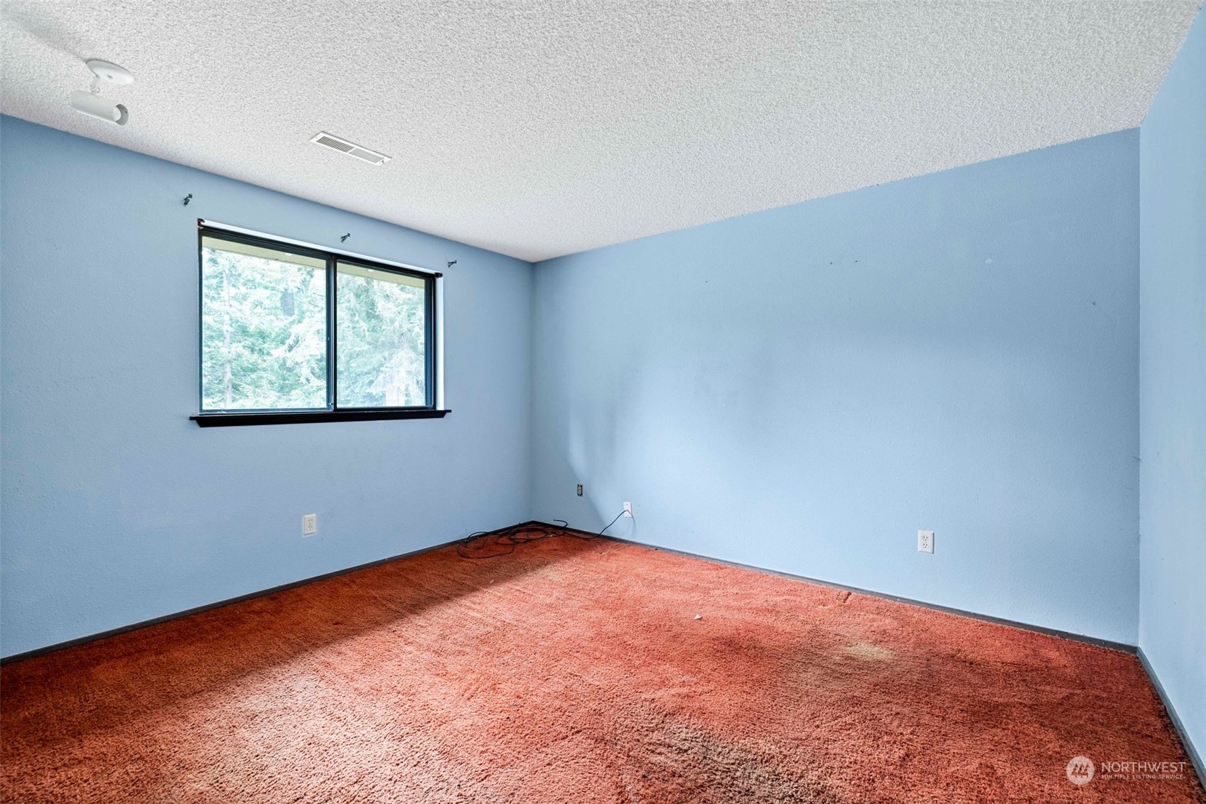 3156 Locker Road Southeast Port Orchard, WA 98366 - Photo 15 of 35 an empty room with windows