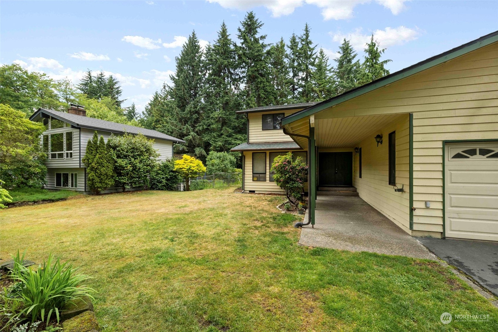3156 Locker Road Southeast Port Orchard, WA 98366 - Photo 25 of 35 a view of a house with backyard and sitting area