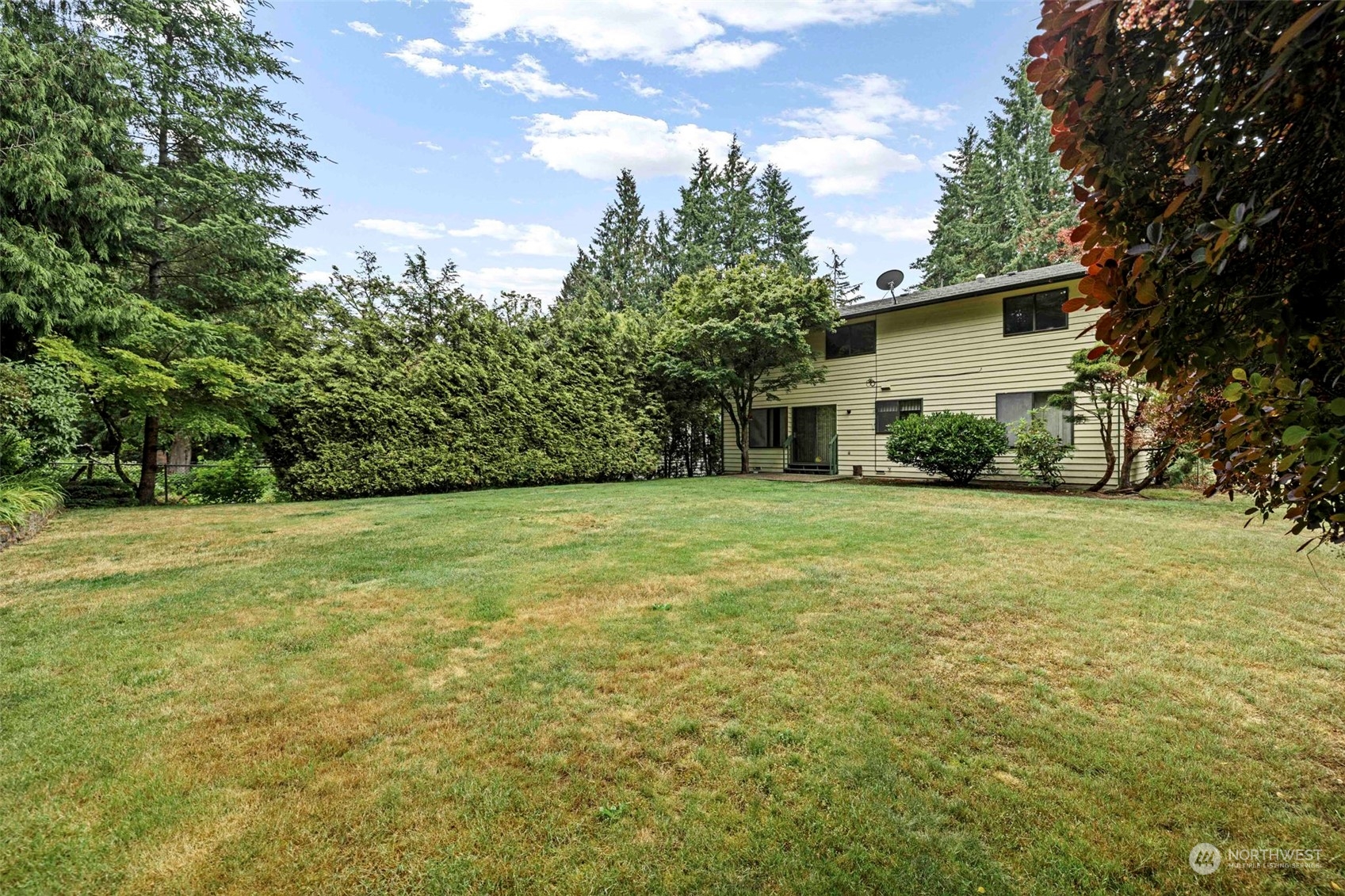 3156 Locker Road Southeast Port Orchard, WA 98366 - Photo 31 of 35 a house view with a garden