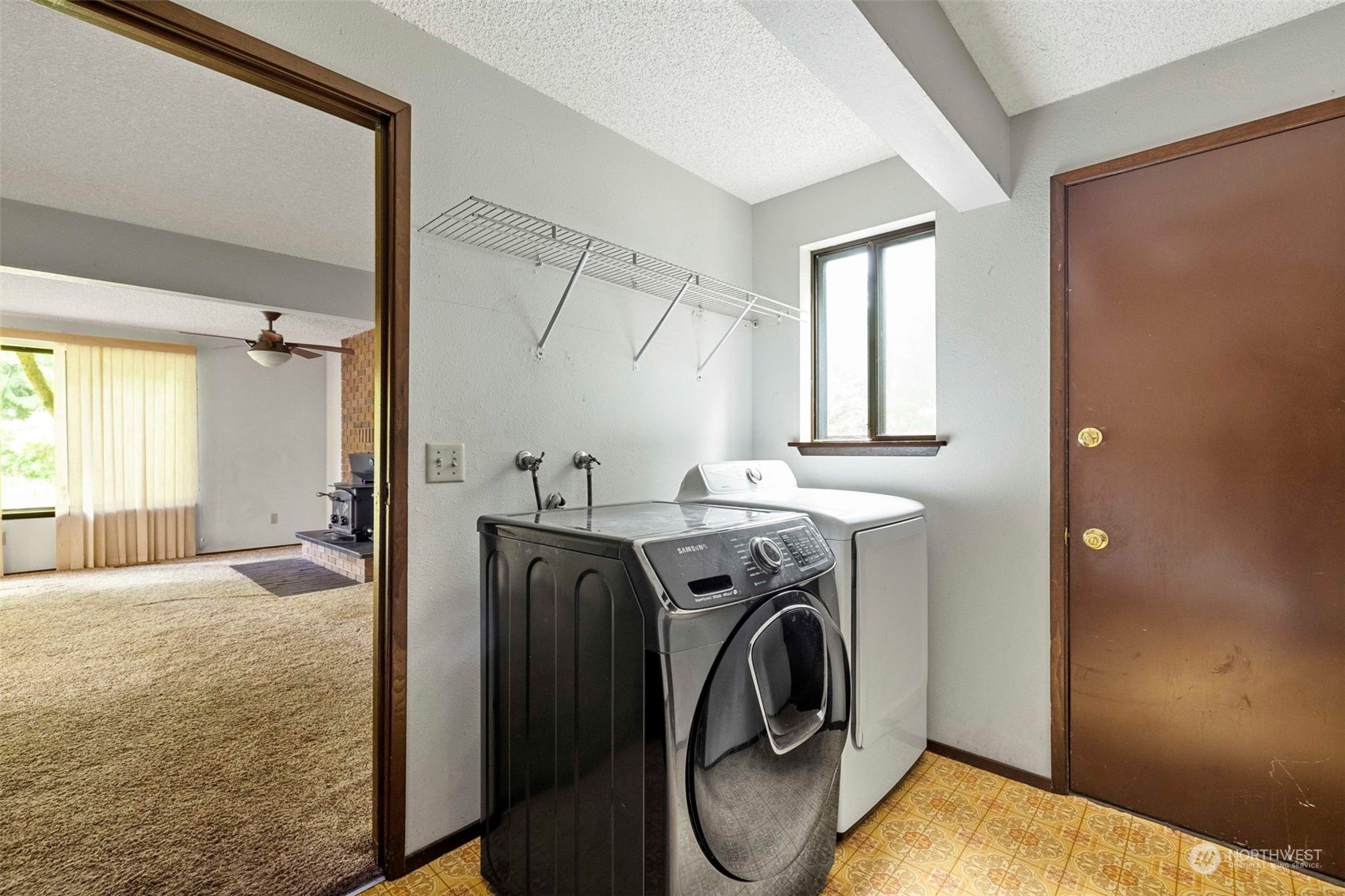 3156 Locker Road Southeast Port Orchard, WA 98366 - Photo 10 of 35 a view of a storage and utility room with a washer dryer