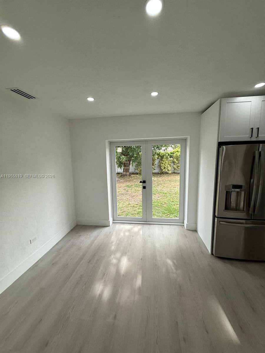 4366 Southwest 5th Terrace Miami, FL 33134 - Photo 12 of 30 a view of an empty room with a window