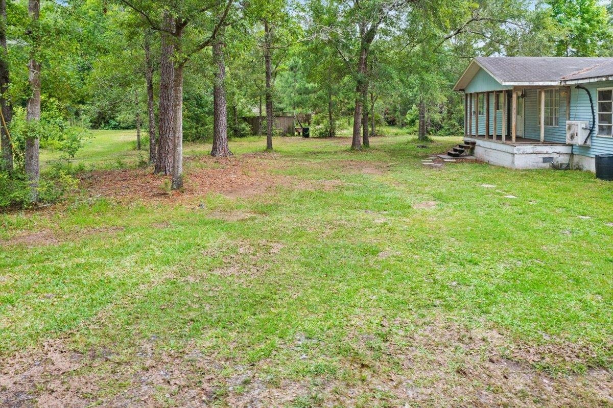 3093-1 Lannie Road Jacksonville, FL 32218 - Photo 8 of 16 a view of a house with a yard and sitting area