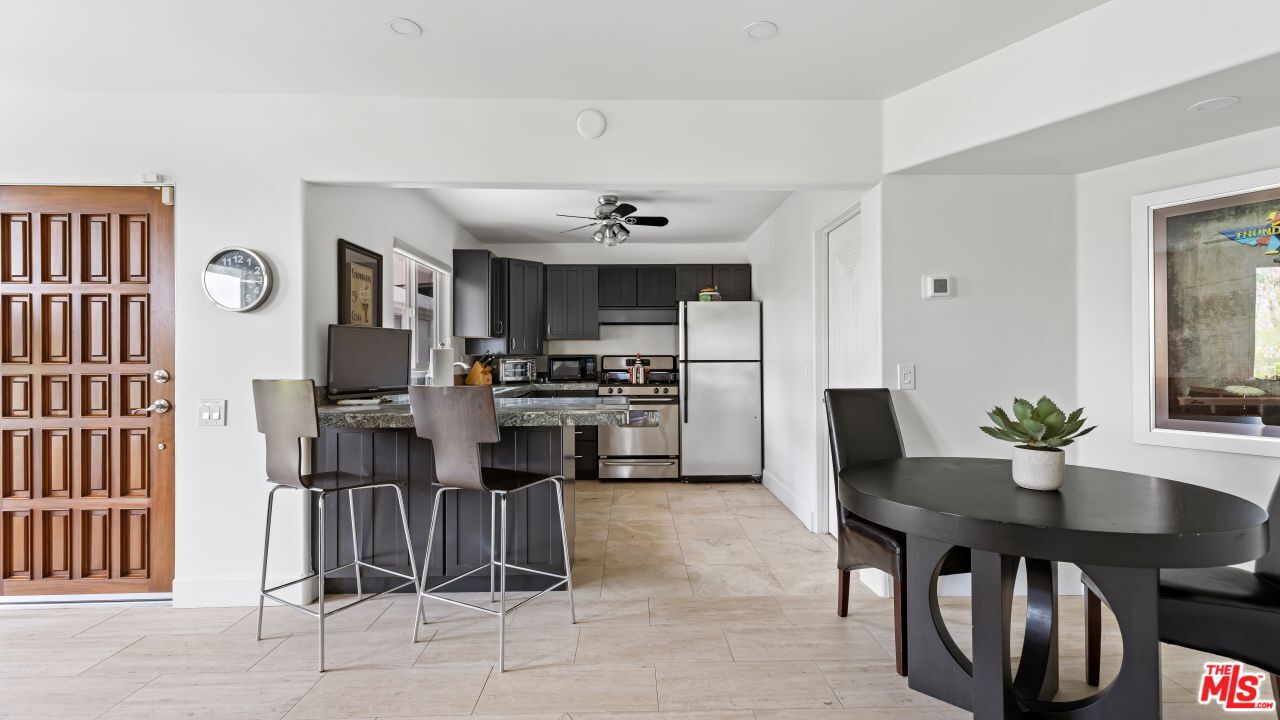 70375 Calico Road Rancho Mirage, CA 92270 - Photo 21 of 46 a view of kitchen with cabinets and wooden floor