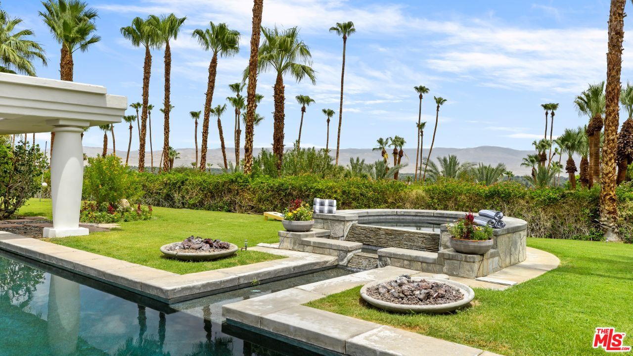 70375 Calico Road Rancho Mirage, CA 92270 - Photo 37 of 46 a view of a patio with furniture and a garden