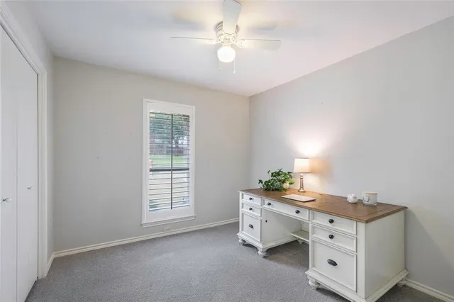 a room with a bed and furniture