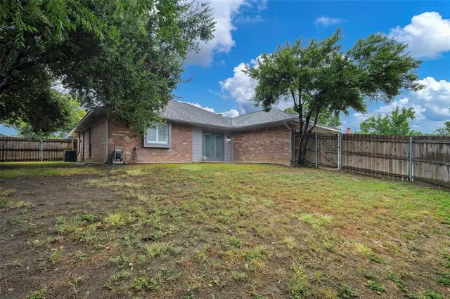a house view with a garden space