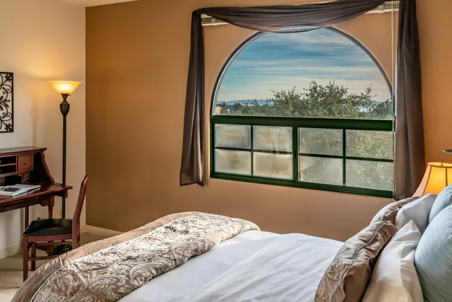 a view of a workspace with furniture