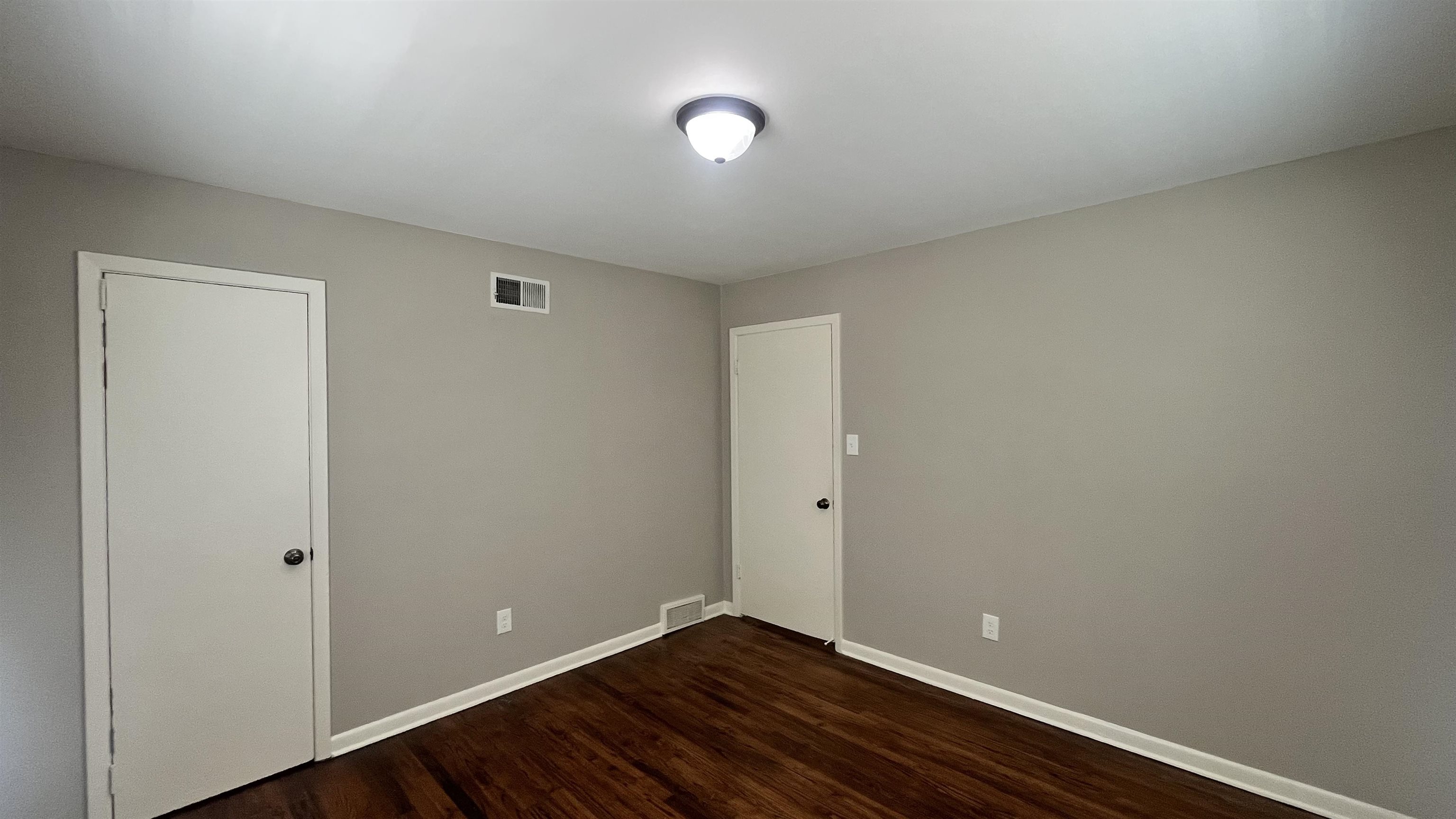 121 West Street Collierville, TN 38017 - Photo 12 of 16 a view of room with wooden floor