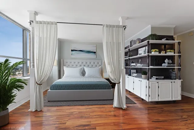 a bedroom with furniture and a book shelf
